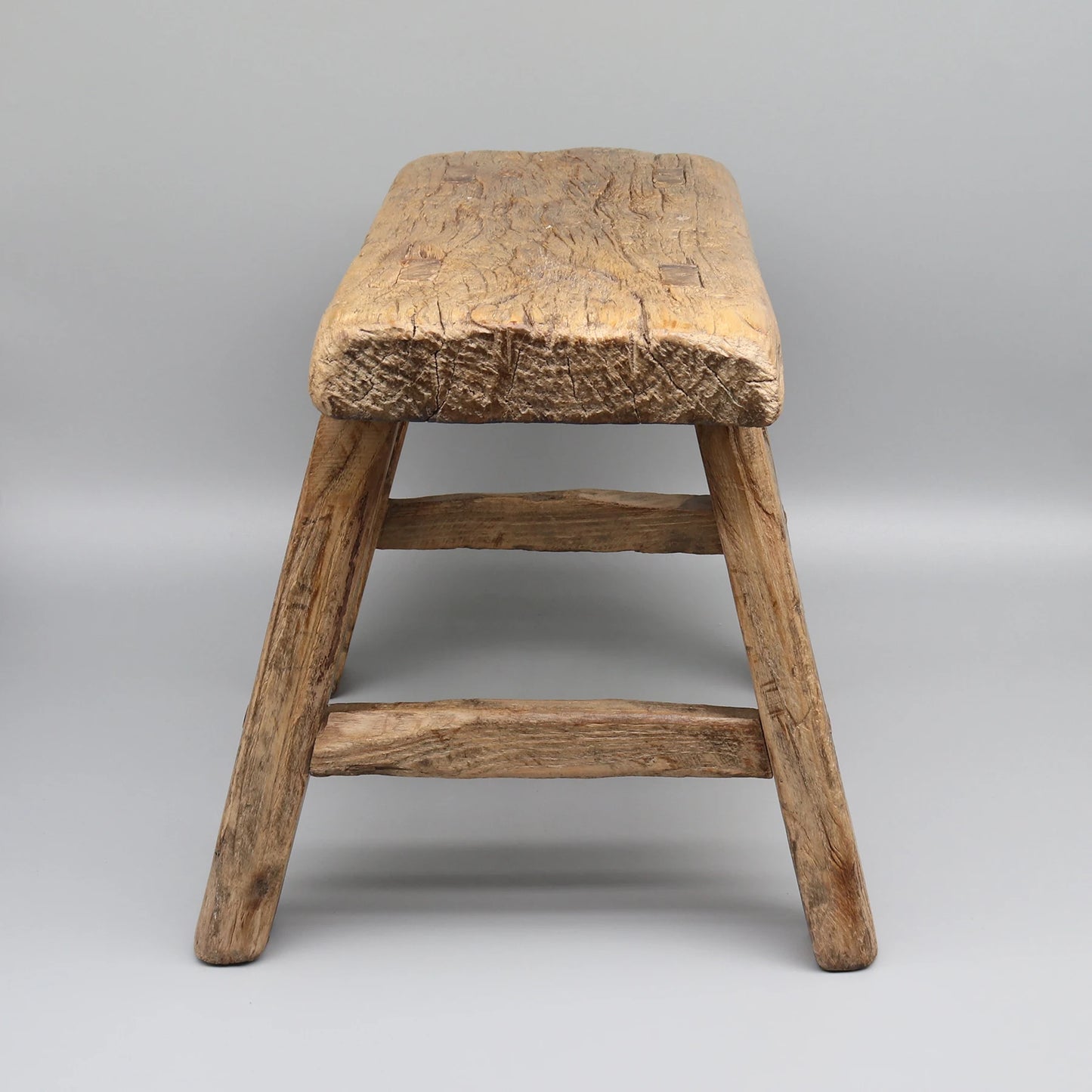 Old solid wood stool.