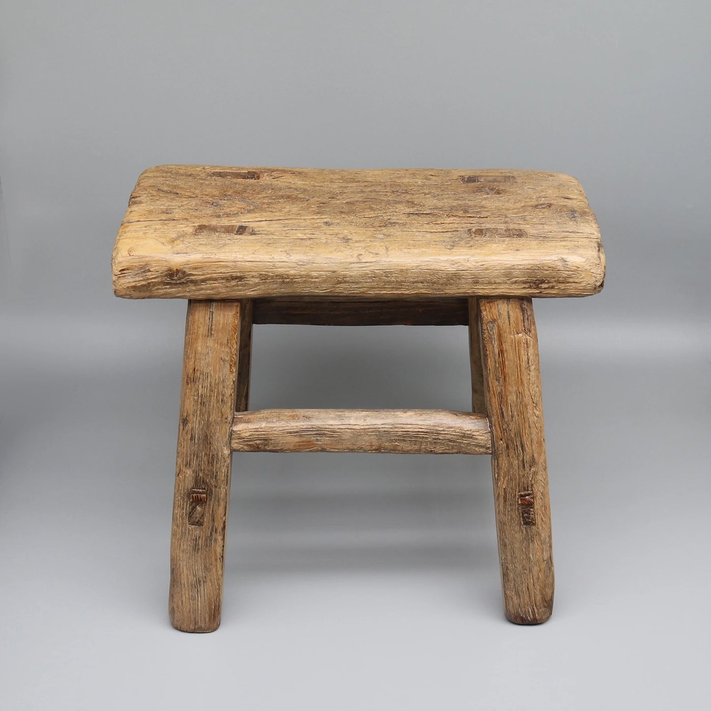 Old solid wood stool.