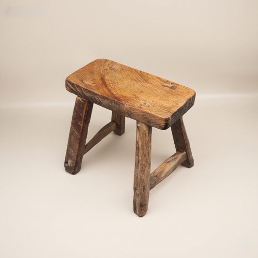 Old solid wood stool.