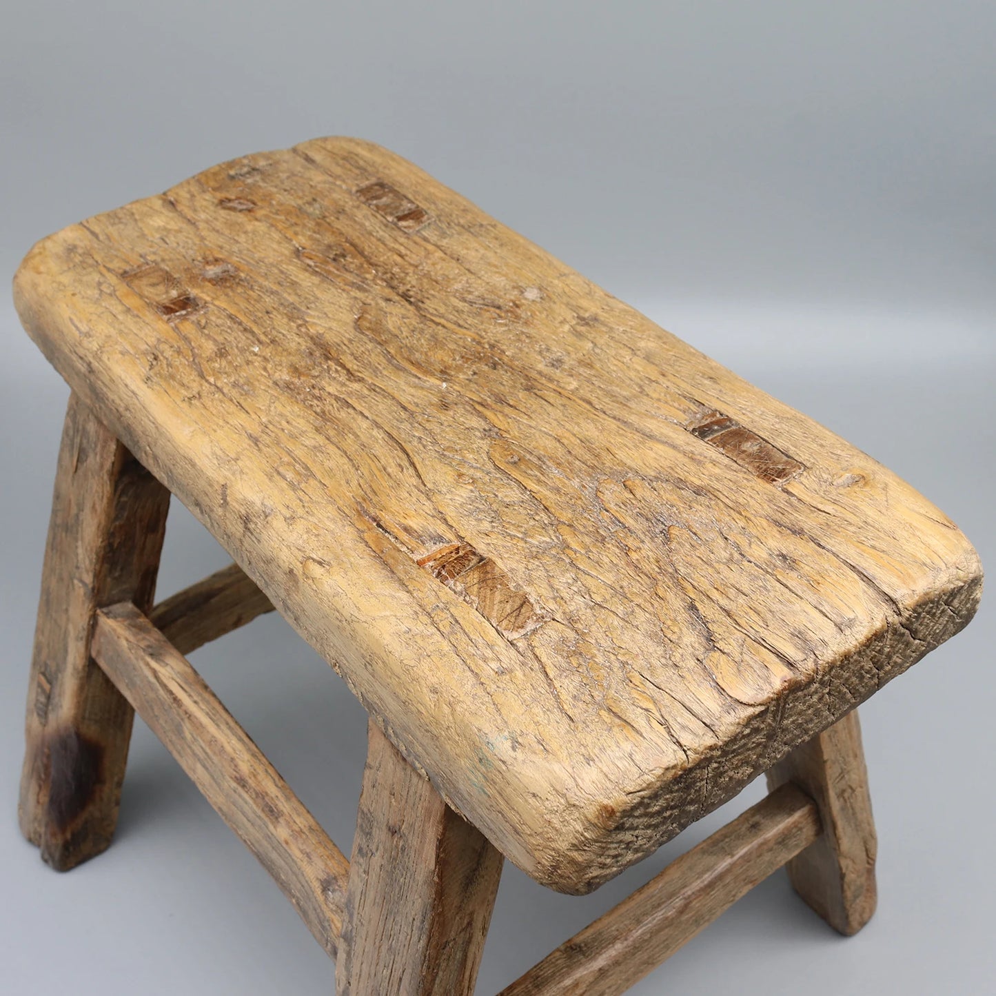 Old solid wood stool.